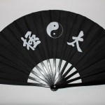 Black fan with design